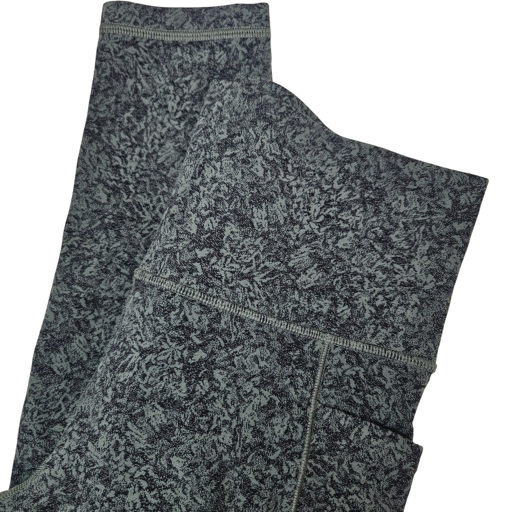 Athleta Salutation Stash Pocket II 7/8 Tight S Olive Green Black Print Legging